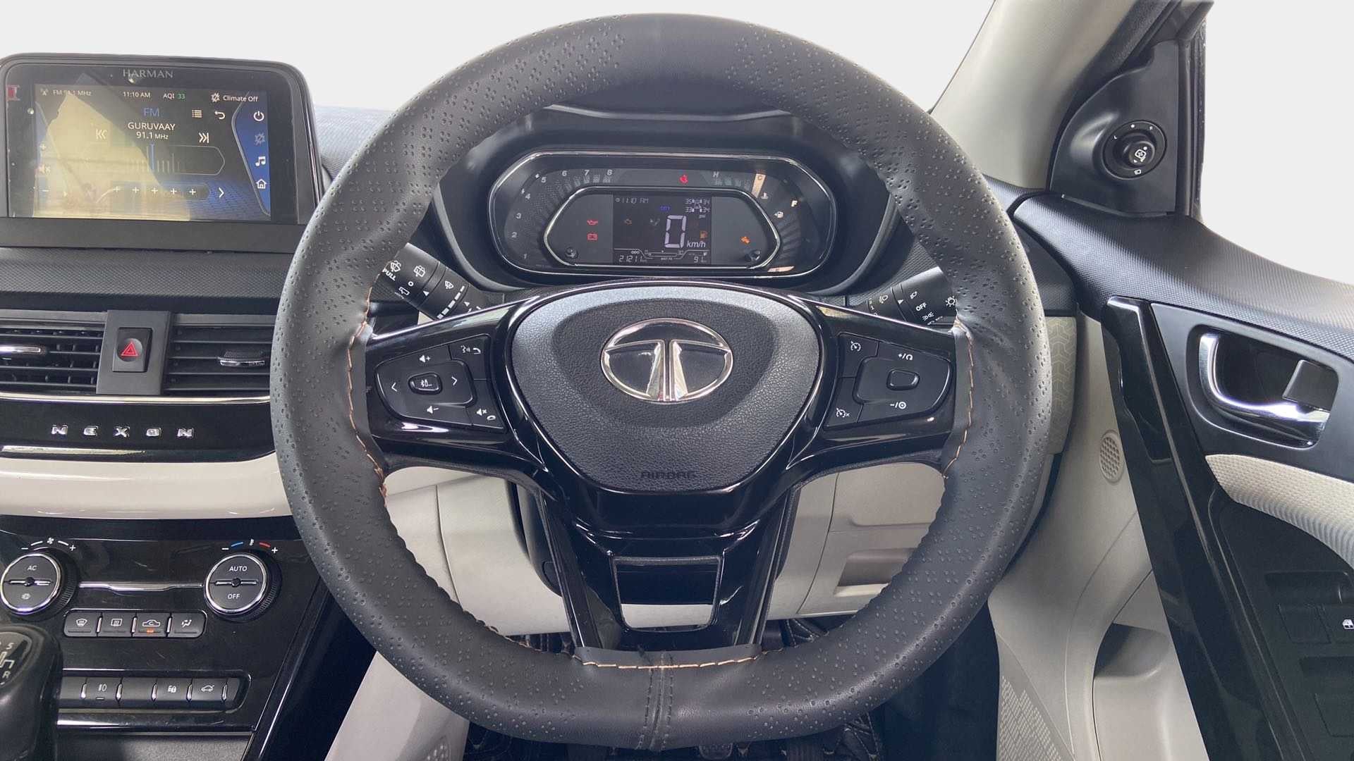 Steering wheel and dashboard of a Tata Nexon 2017-2023