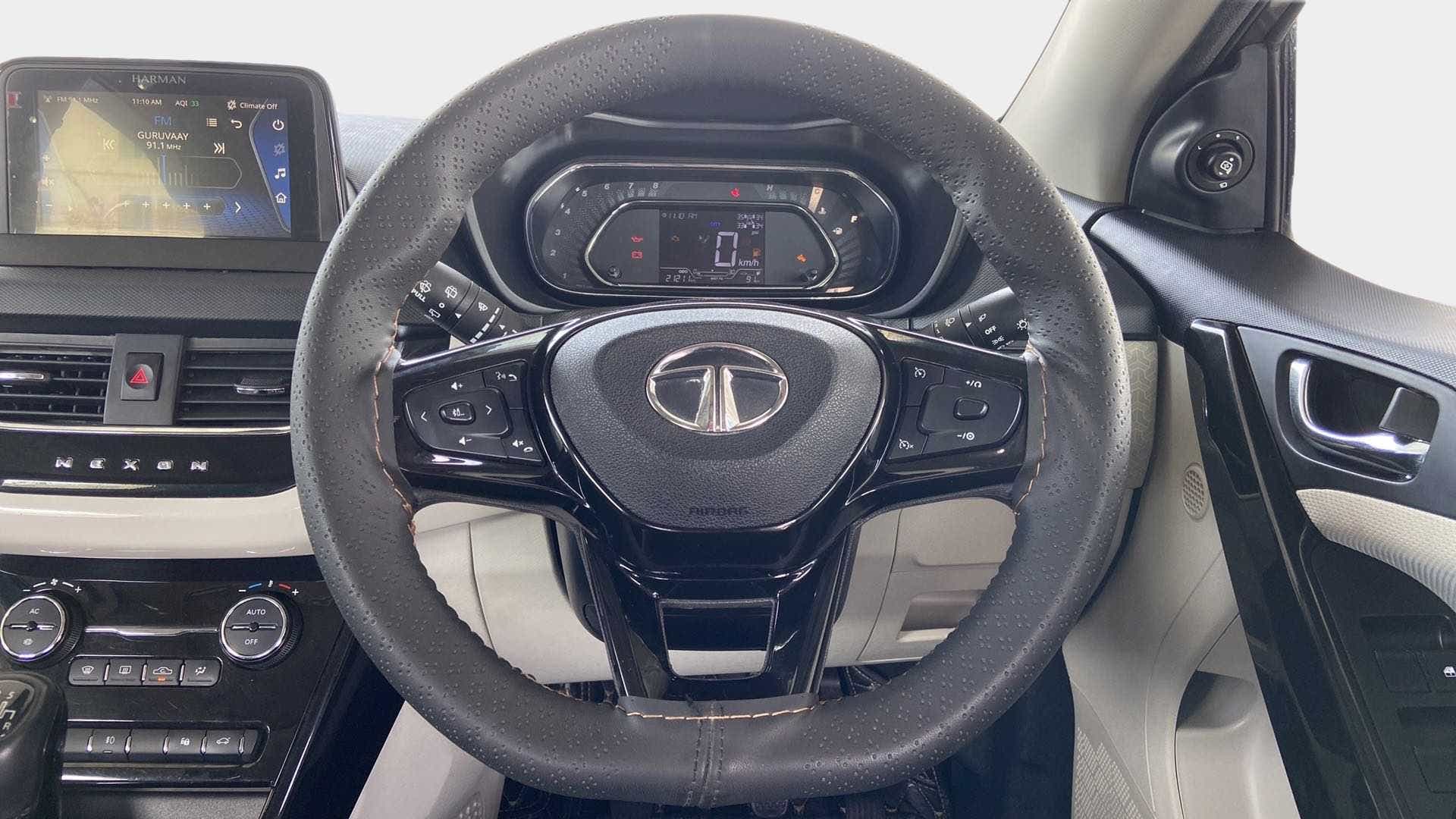 Steering wheel and dashboard of a Tata Nexon 2017-2023