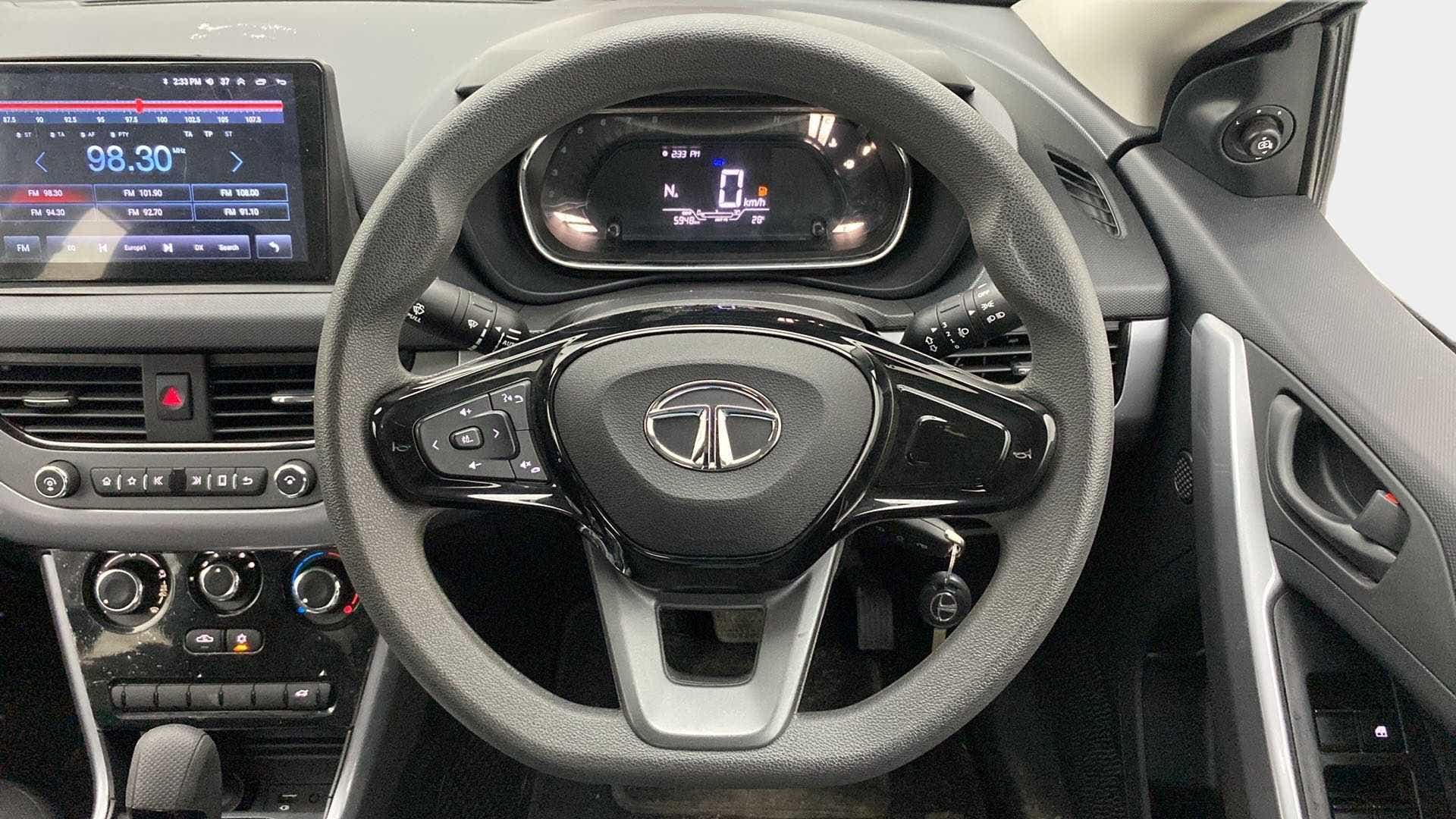 Steering wheel and dashboard of a Tata Nexon 2017-2023
