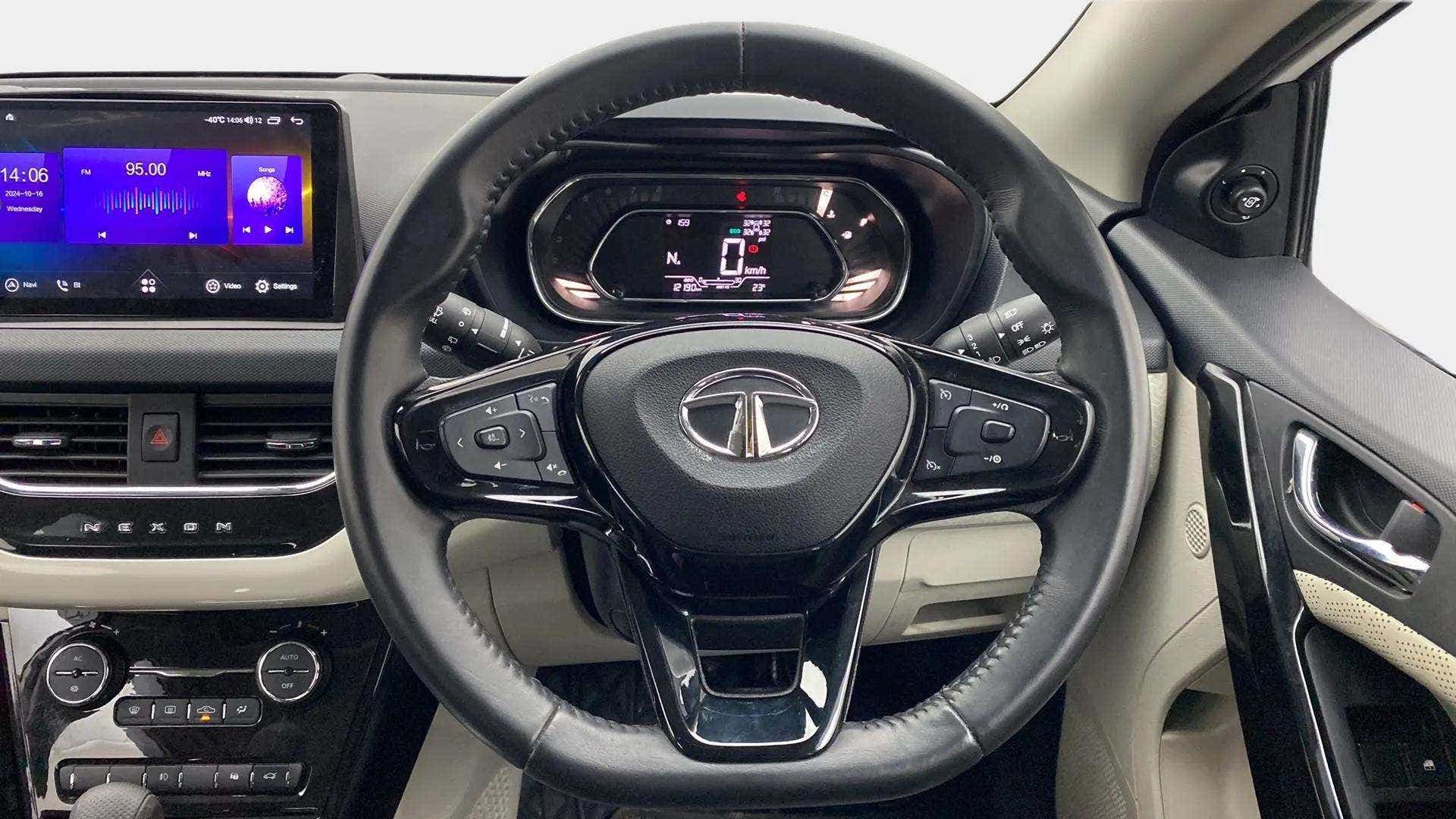 Steering wheel and dashboard of a Tata Nexon 2017-2023