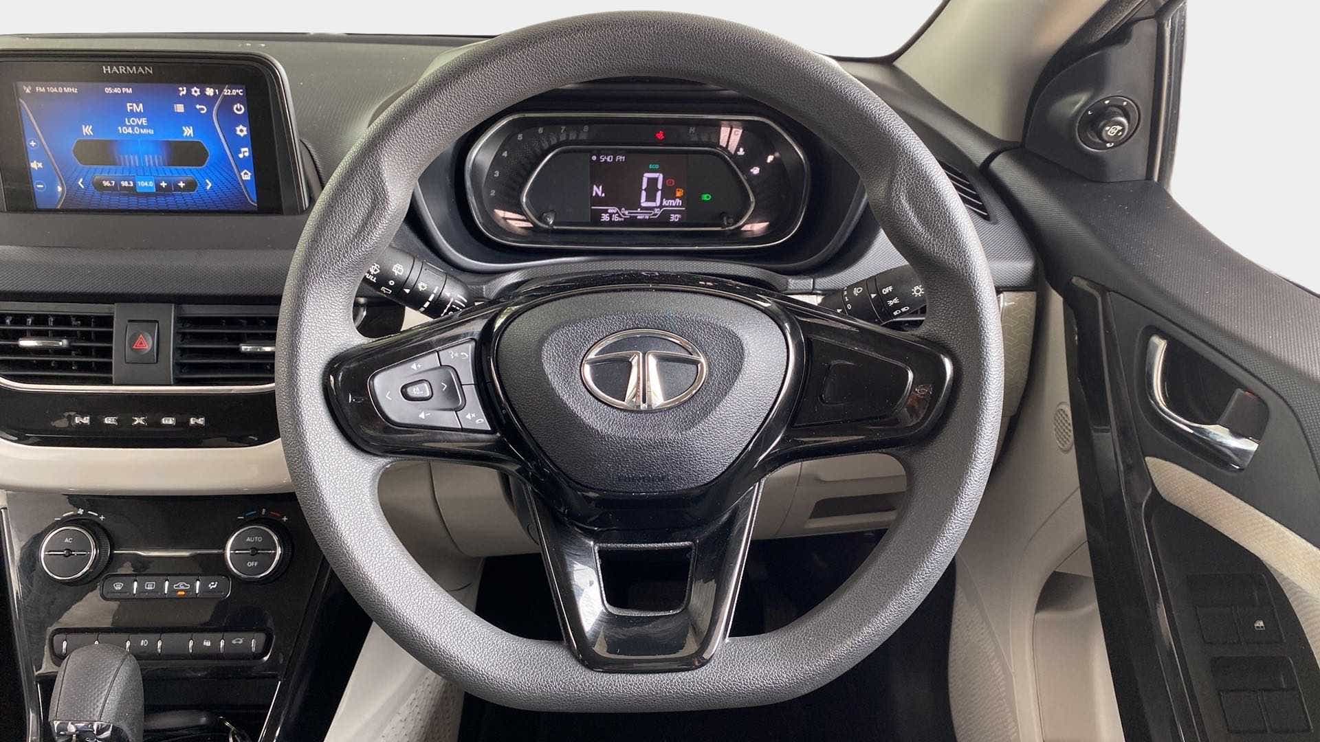 Steering wheel and dashboard of a Tata Nexon 2017-2023