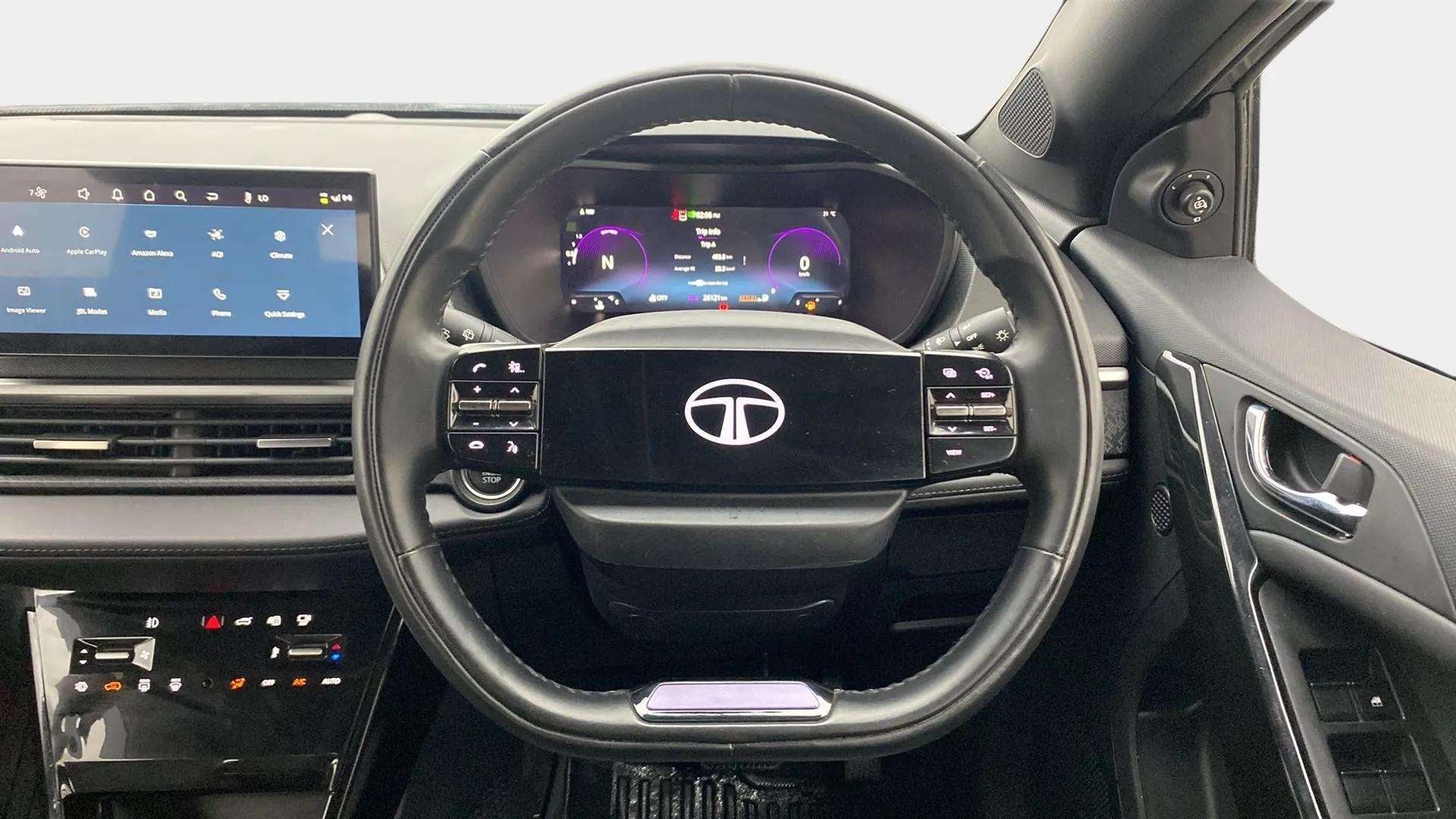 Interior dashboard and steering wheel of a Tata Nexon 2017-2023