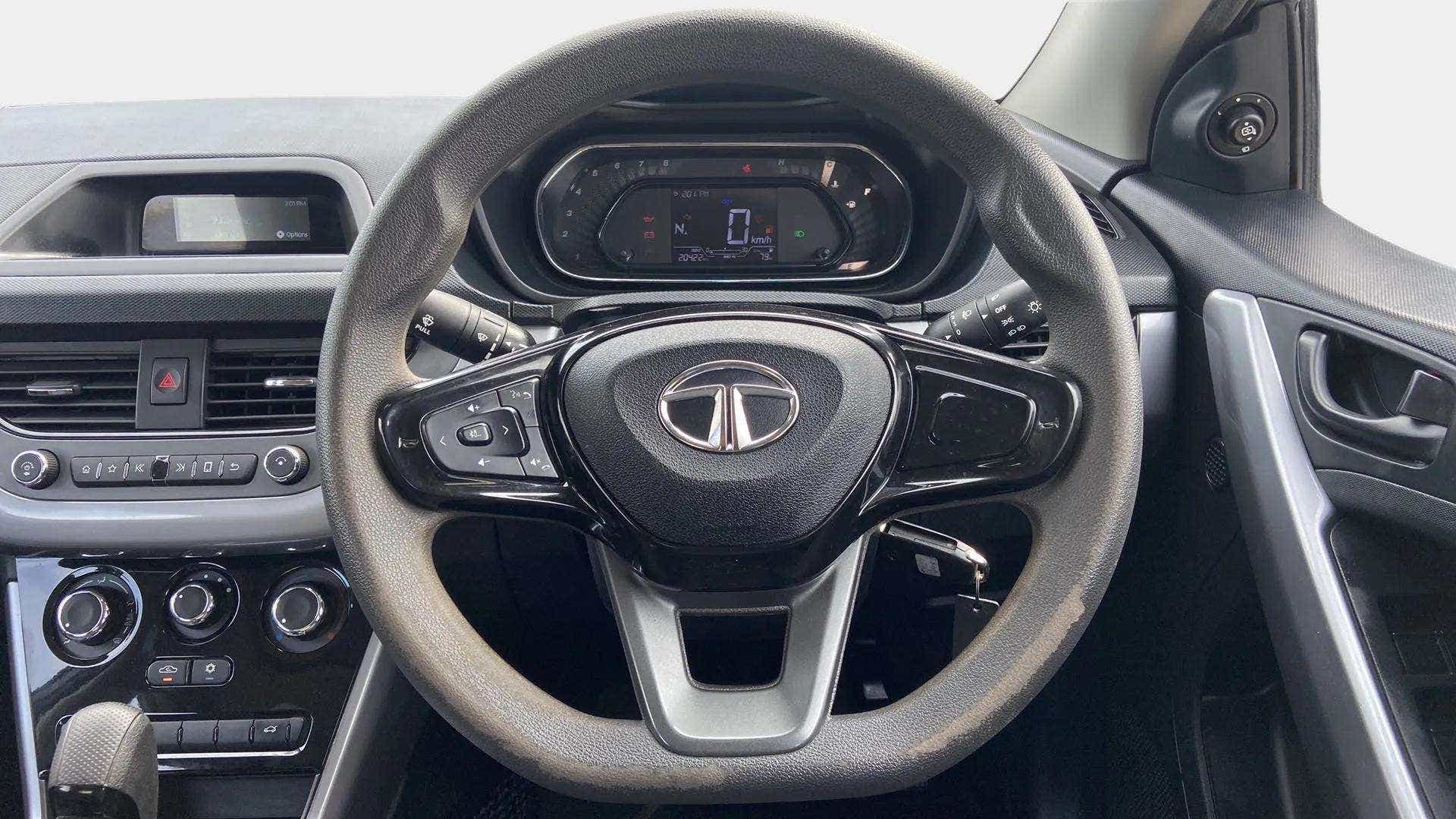 Steering wheel and dashboard of a Tata Nexon 2017-2023