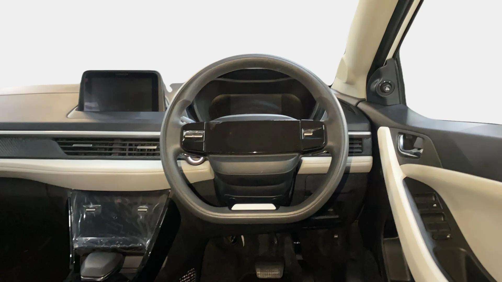 Dashboard and steering wheel of a Tata Nexon