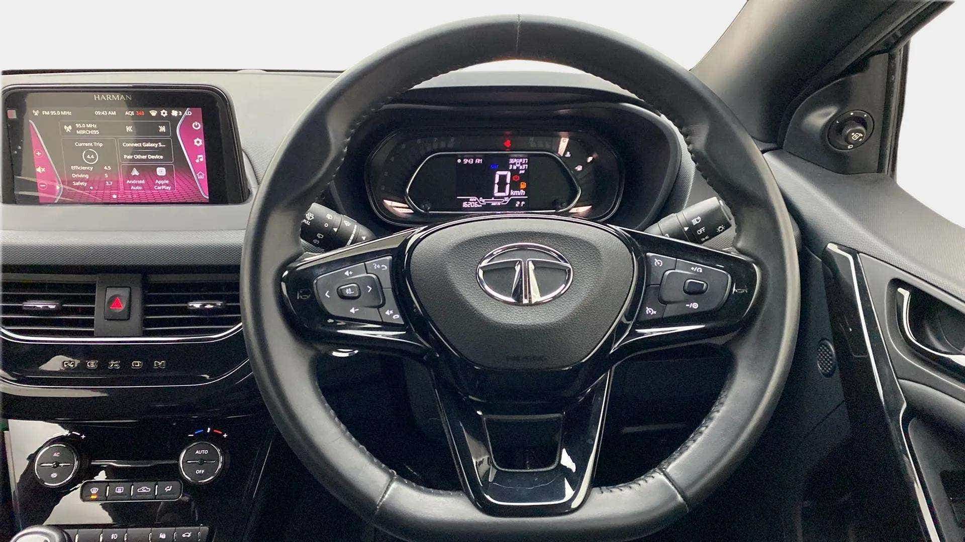Steering wheel and dashboard of a Tata Nexon 2017-2023