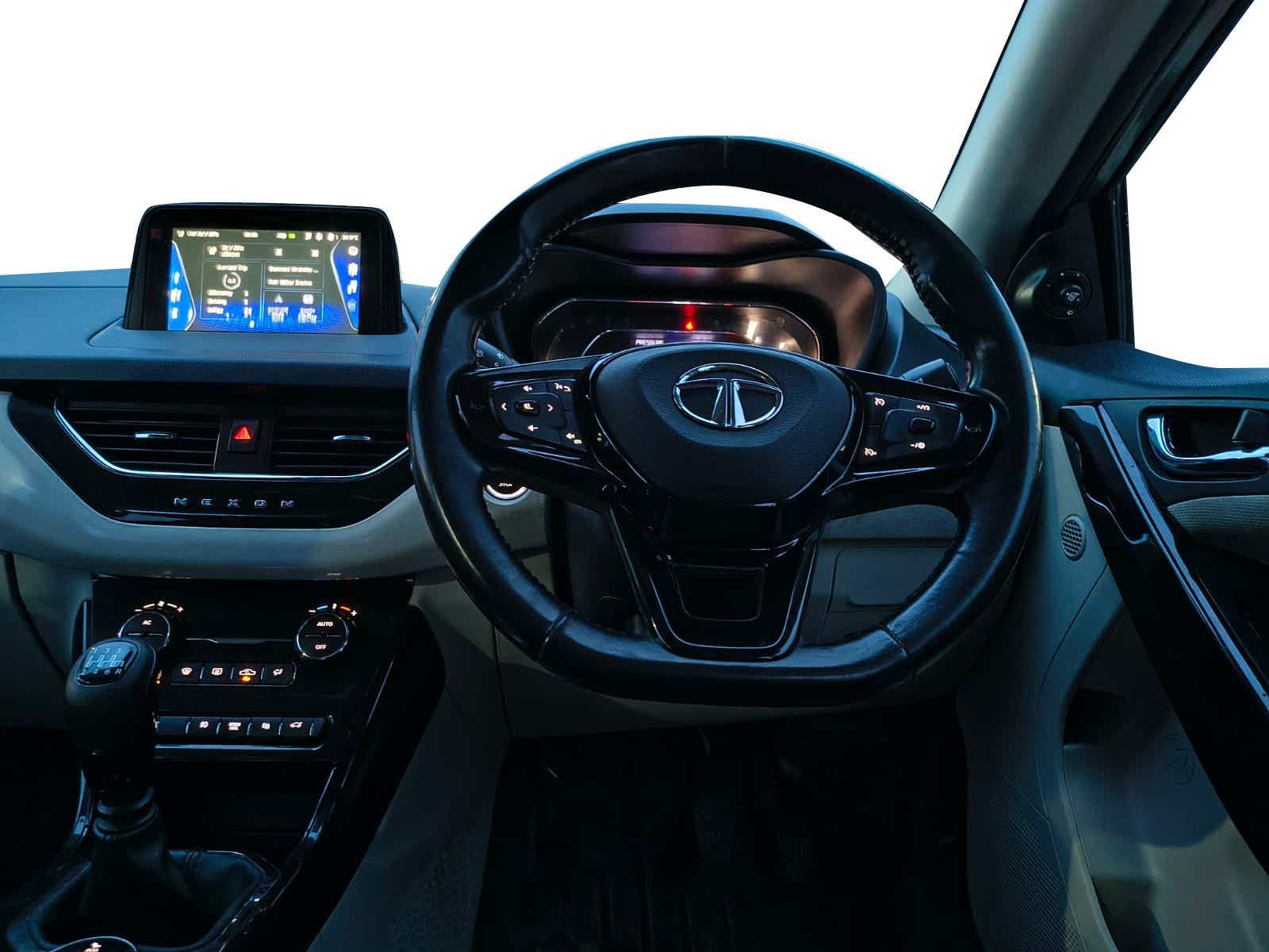 Dashboard and steering wheel of a Tata Nexon 2017-2023