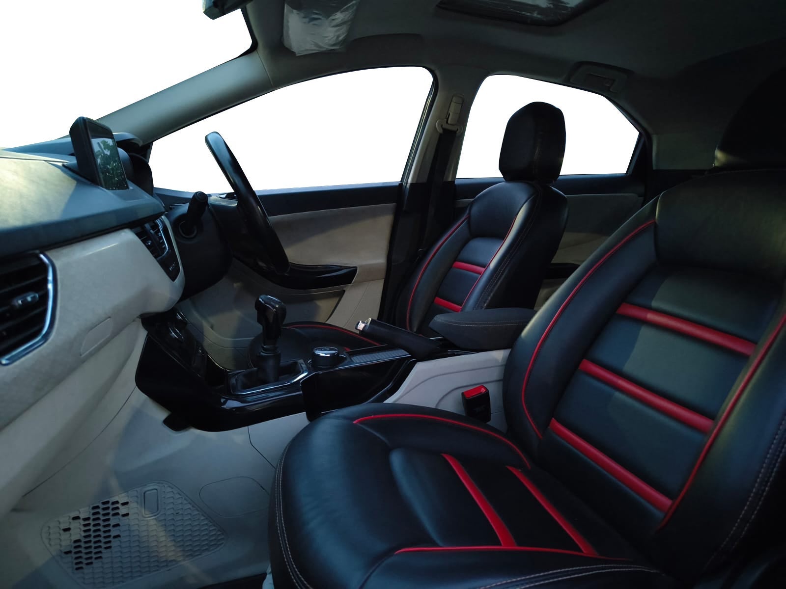 Interior front seats and dashboard of a Tata Nexon 2017-2023