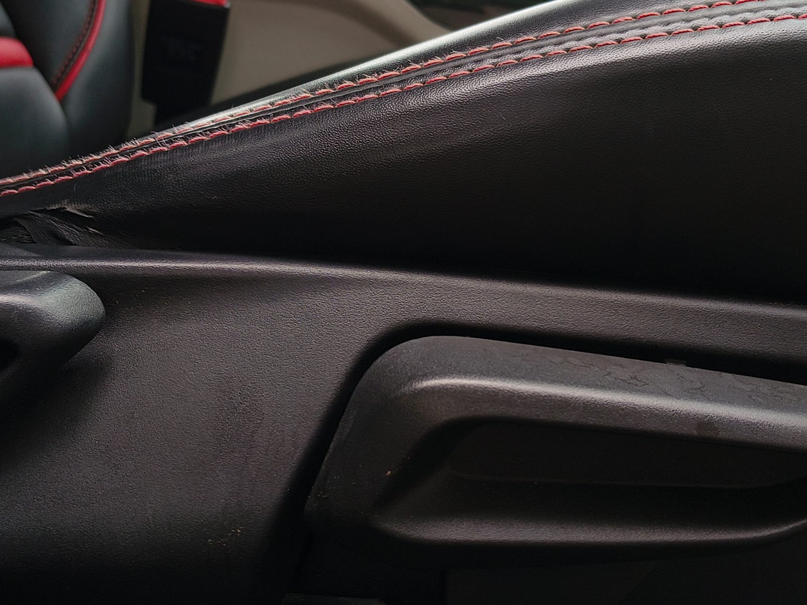 Close-up of the interior door trim of a Tata Nexon 2017-2023