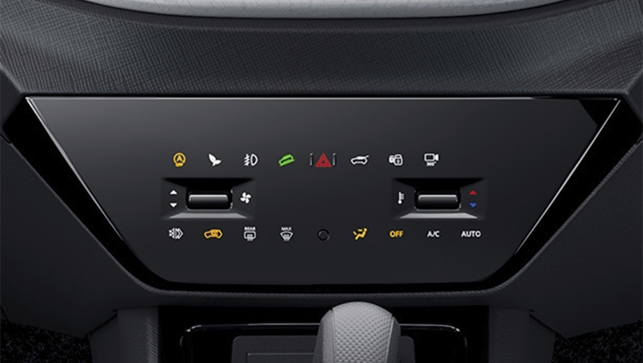Interior dashboard controls of a black Tata Punch Facelift