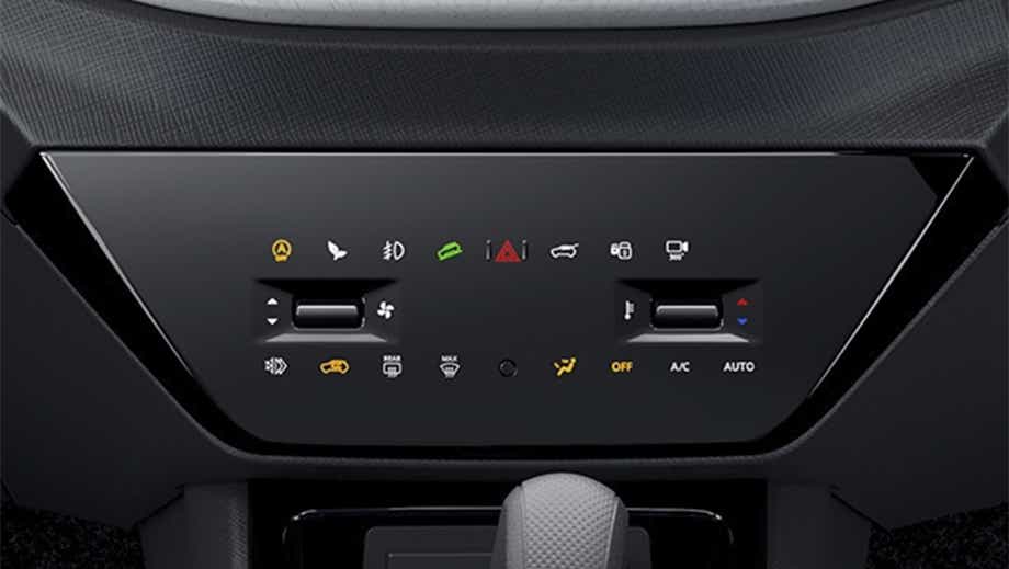 Interior dashboard controls of a black Tata Punch Facelift