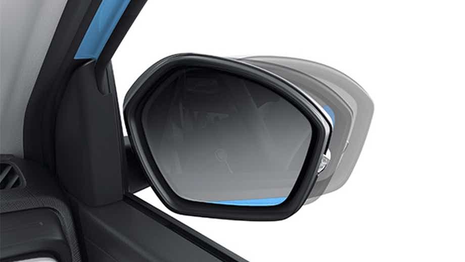 Side mirror close-up of a black Tata Punch Facelift