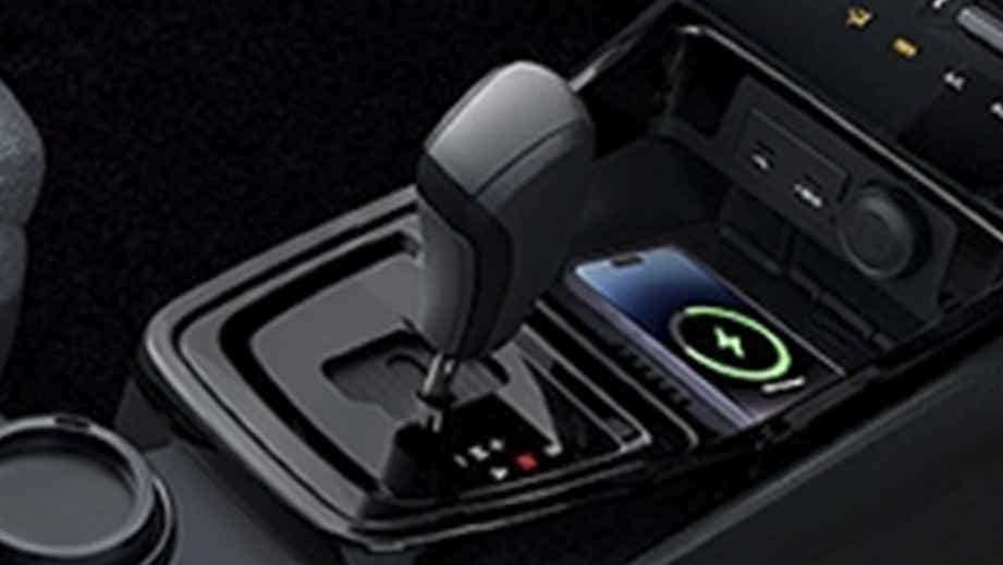 Gear lever and center console of a black Tata Punch Facelift