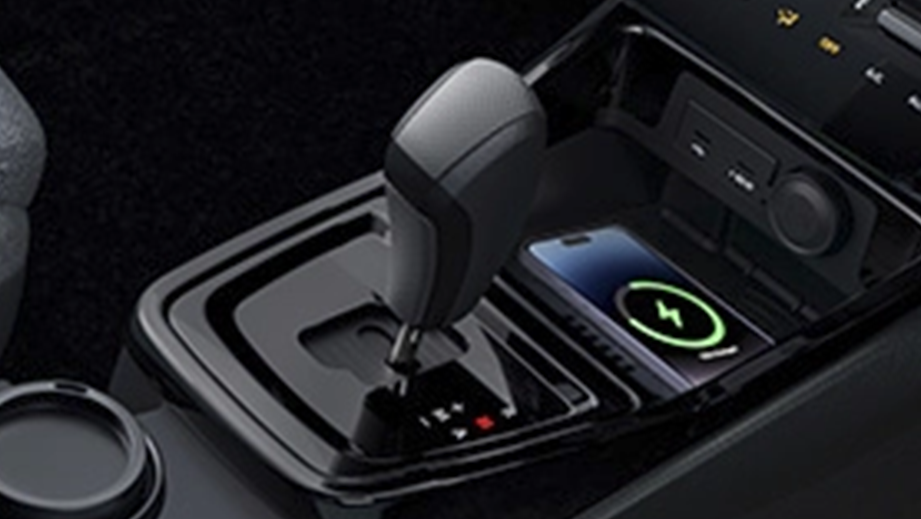 Gear lever and center console of a black Tata Punch Facelift