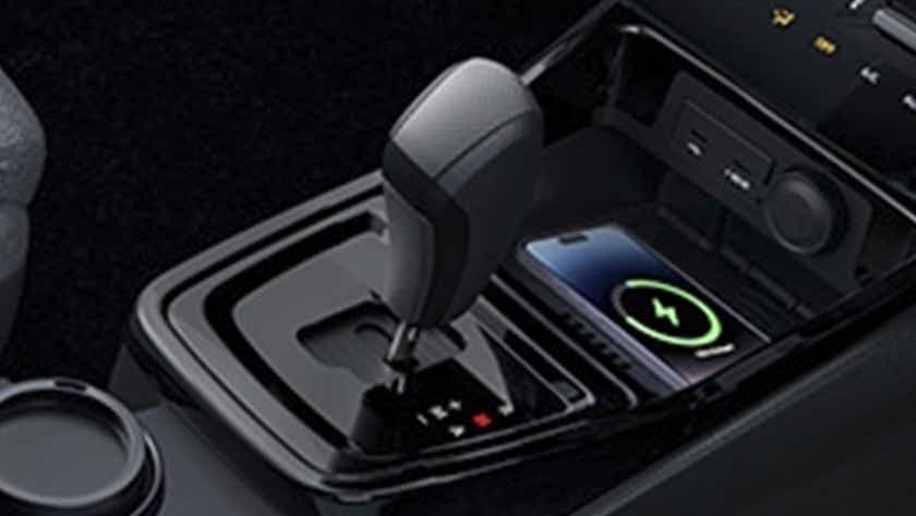 Gear lever and center console of a black Tata Punch Facelift