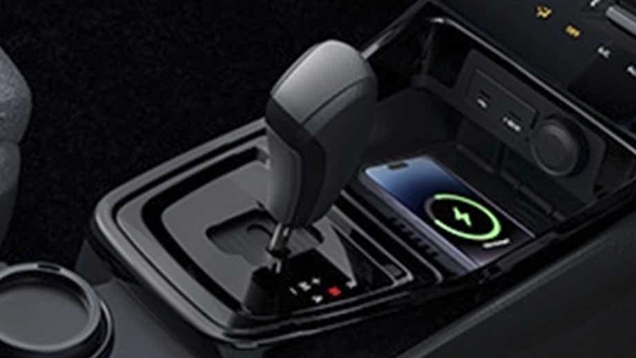 Gear lever and center console of a black Tata Punch Facelift