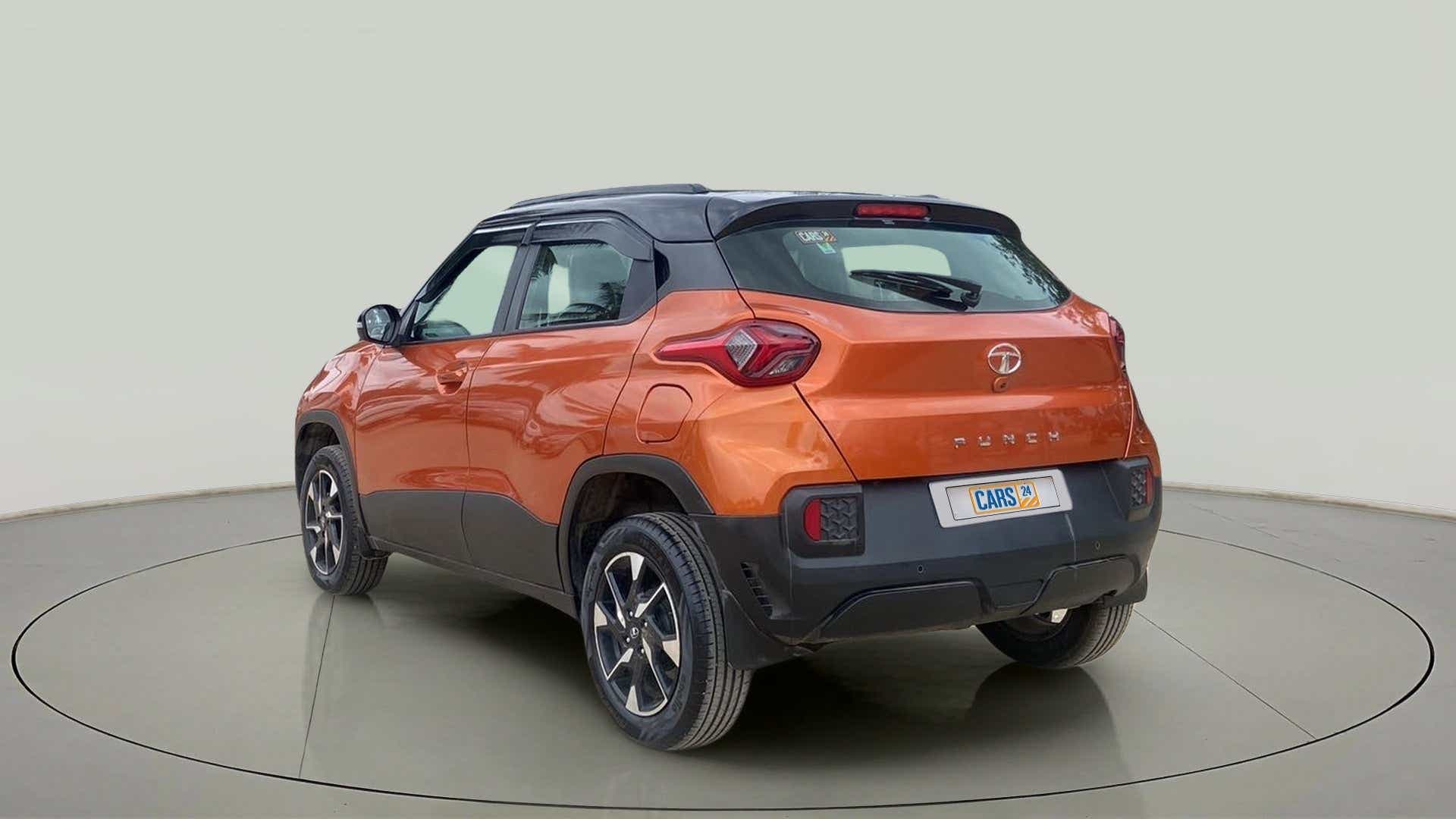 Rear three-quarter view of a Atomic Orange Tata Punch