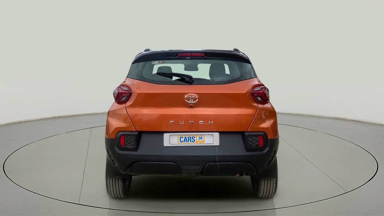 Rear view of a Atomic Orange Tata Punch