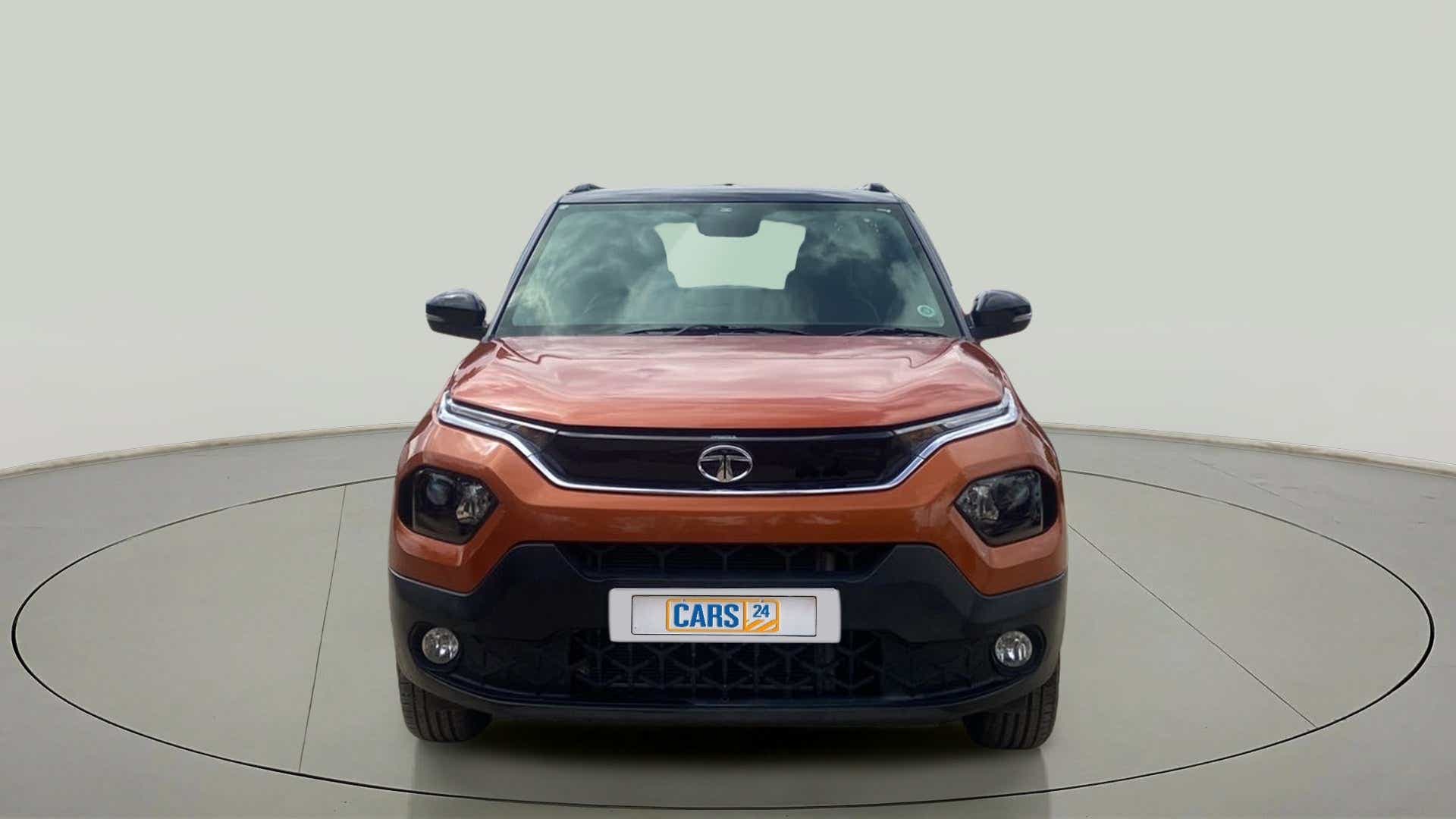 Front view of a Atomic Orange Tata Punch