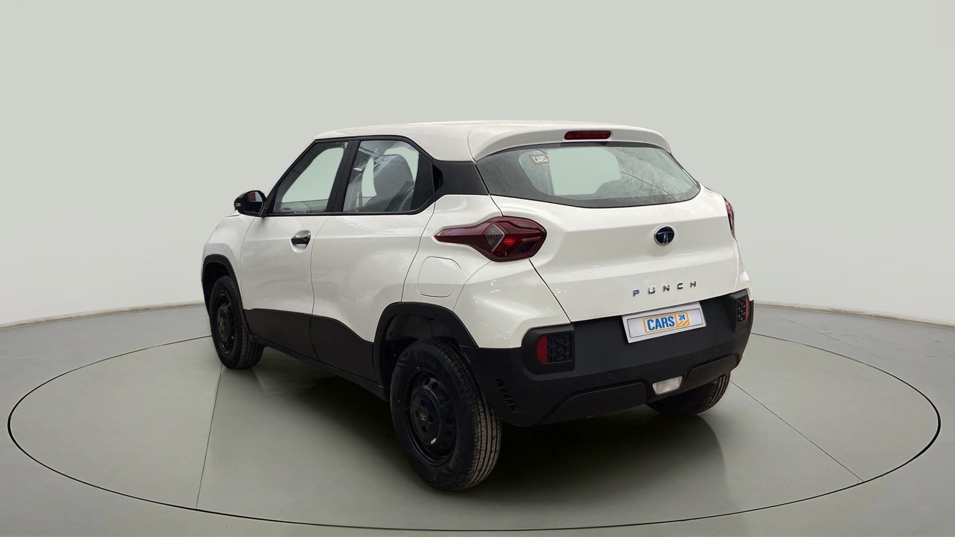 Rear three-quarter view of a Orcus White Tata Punch