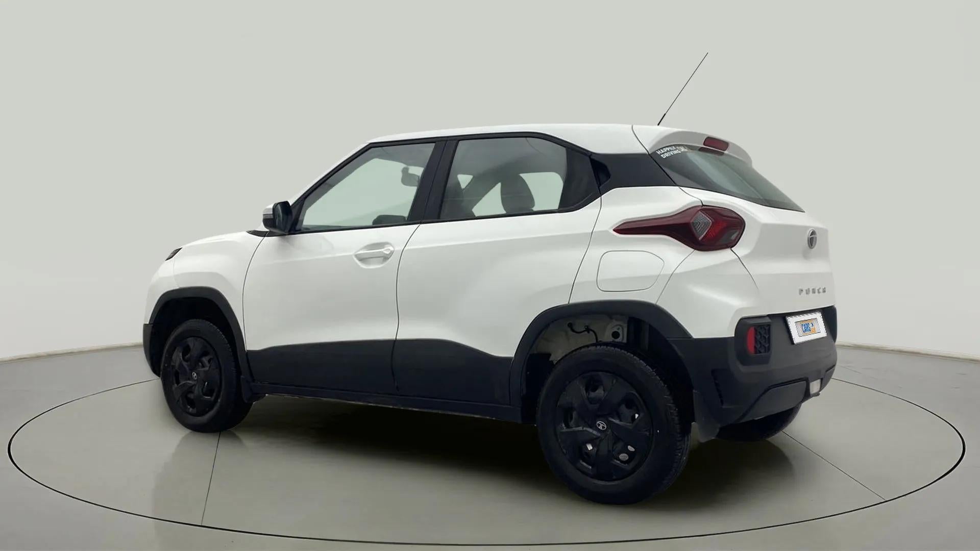 Rear three-quarter view of a Orcus White Tata Punch