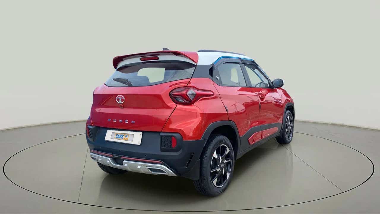 Rear three-quarter view of a Calypso Red with White Roof Tata Punch