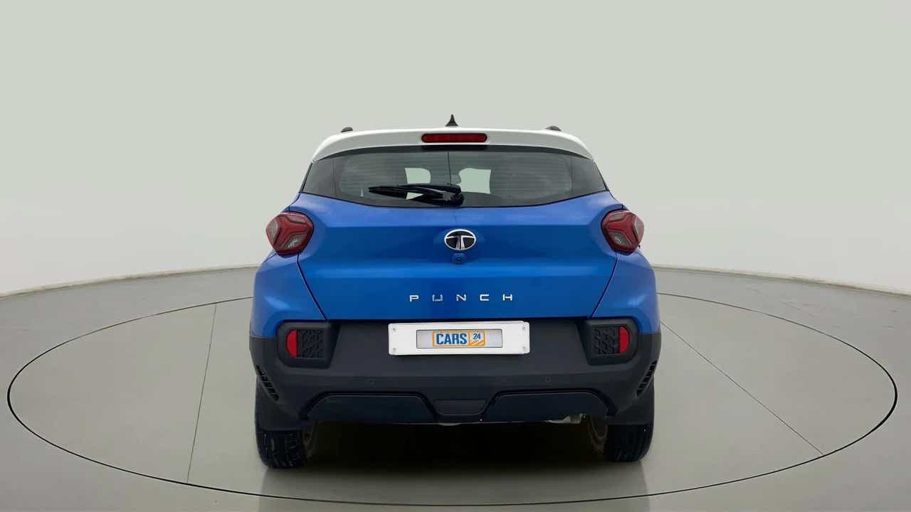 Rear view of a tornado blue with white roof Tata Punch