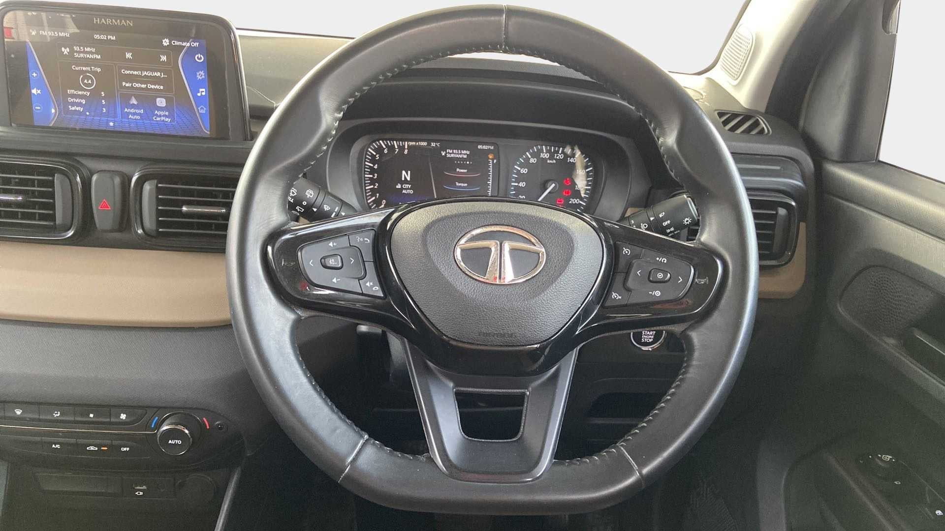 Interior dashboard and steering wheel of a Tata Punch