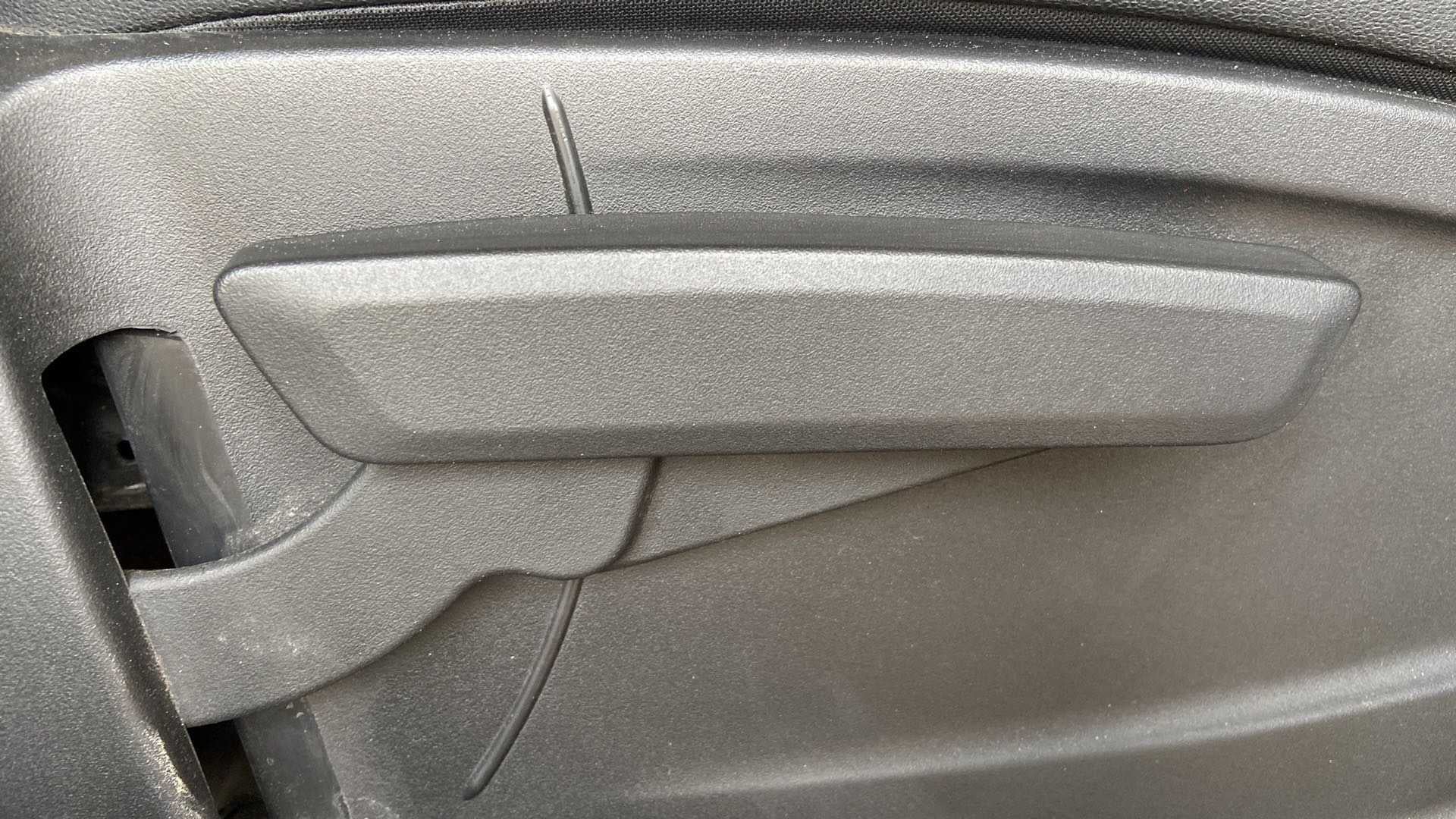 Close-up of an interior door handle of a Tata Punch