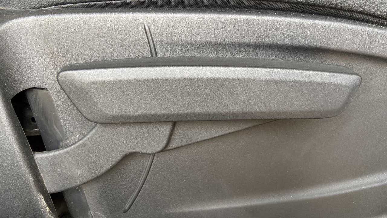 Close-up of an interior door handle of a Tata Punch