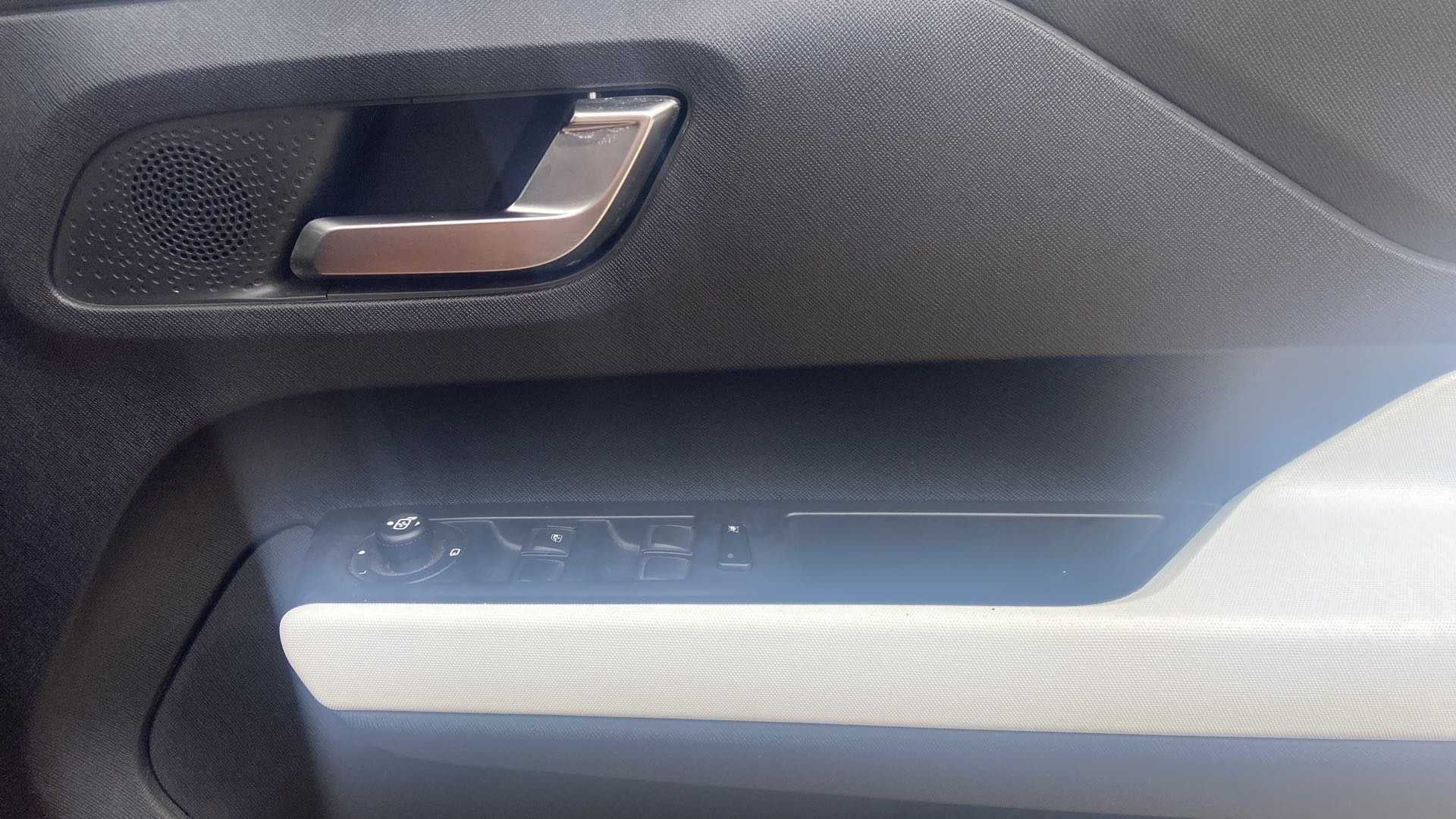 Interior door panel of a Tata Punch