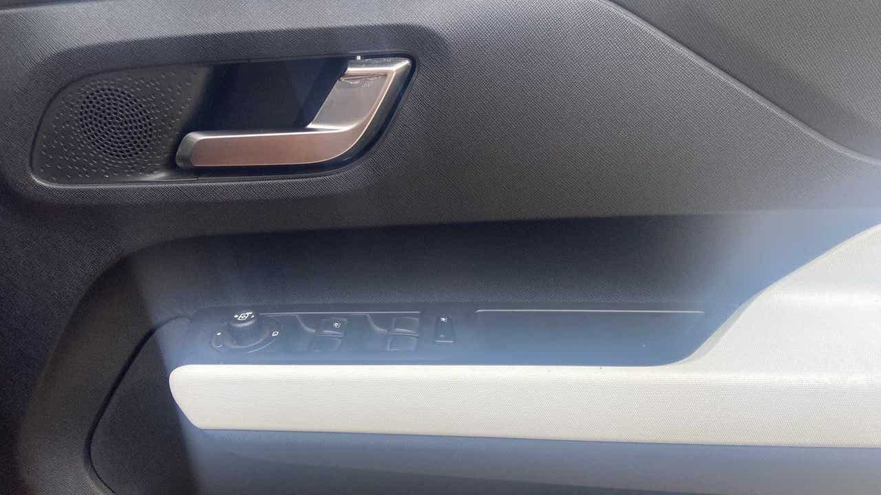 Interior door panel of a Tata Punch