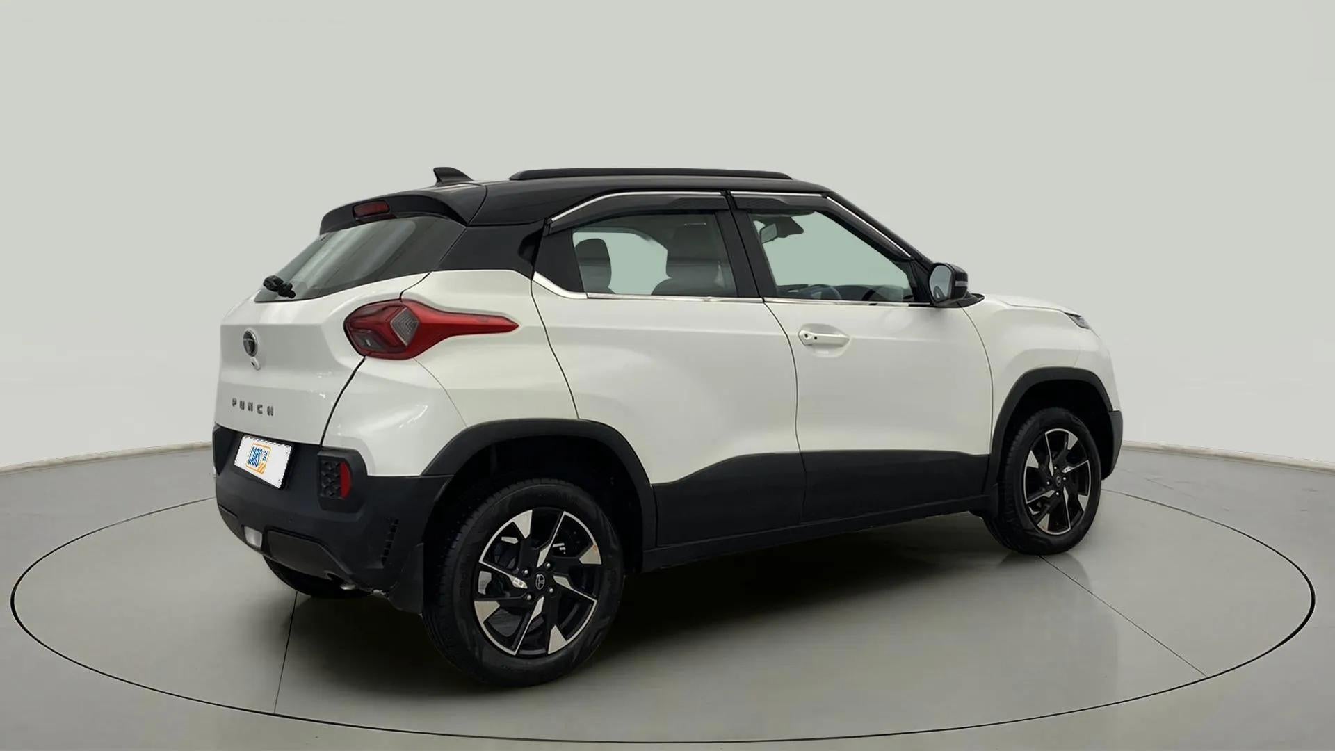 Rear three-quarter view of a Orcus White Tata Punch