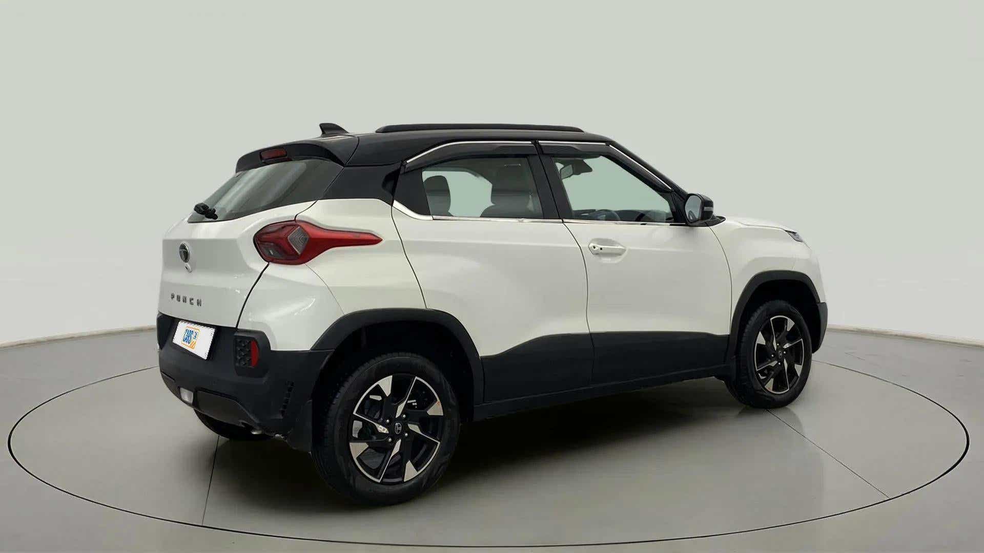 Rear three-quarter view of a Orcus White Tata Punch