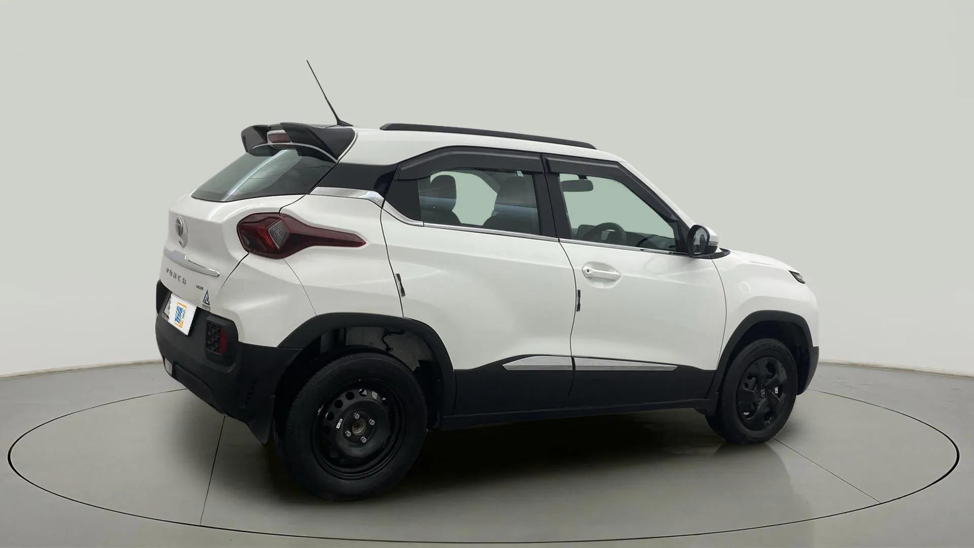 Rear three-quarter view of a Orcus White Tata Punch