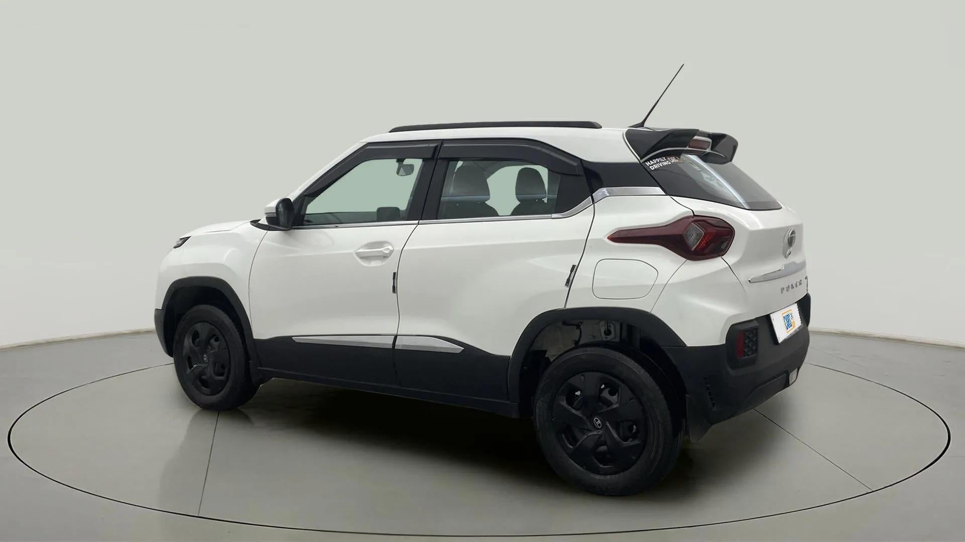 Rear three-quarter view of a Orcus White Tata Punch