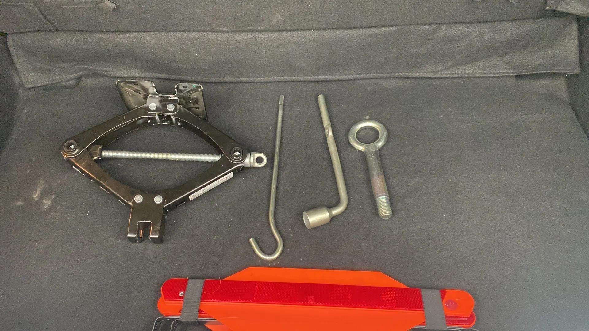 Car jack and emergency tools of a Tata Punch