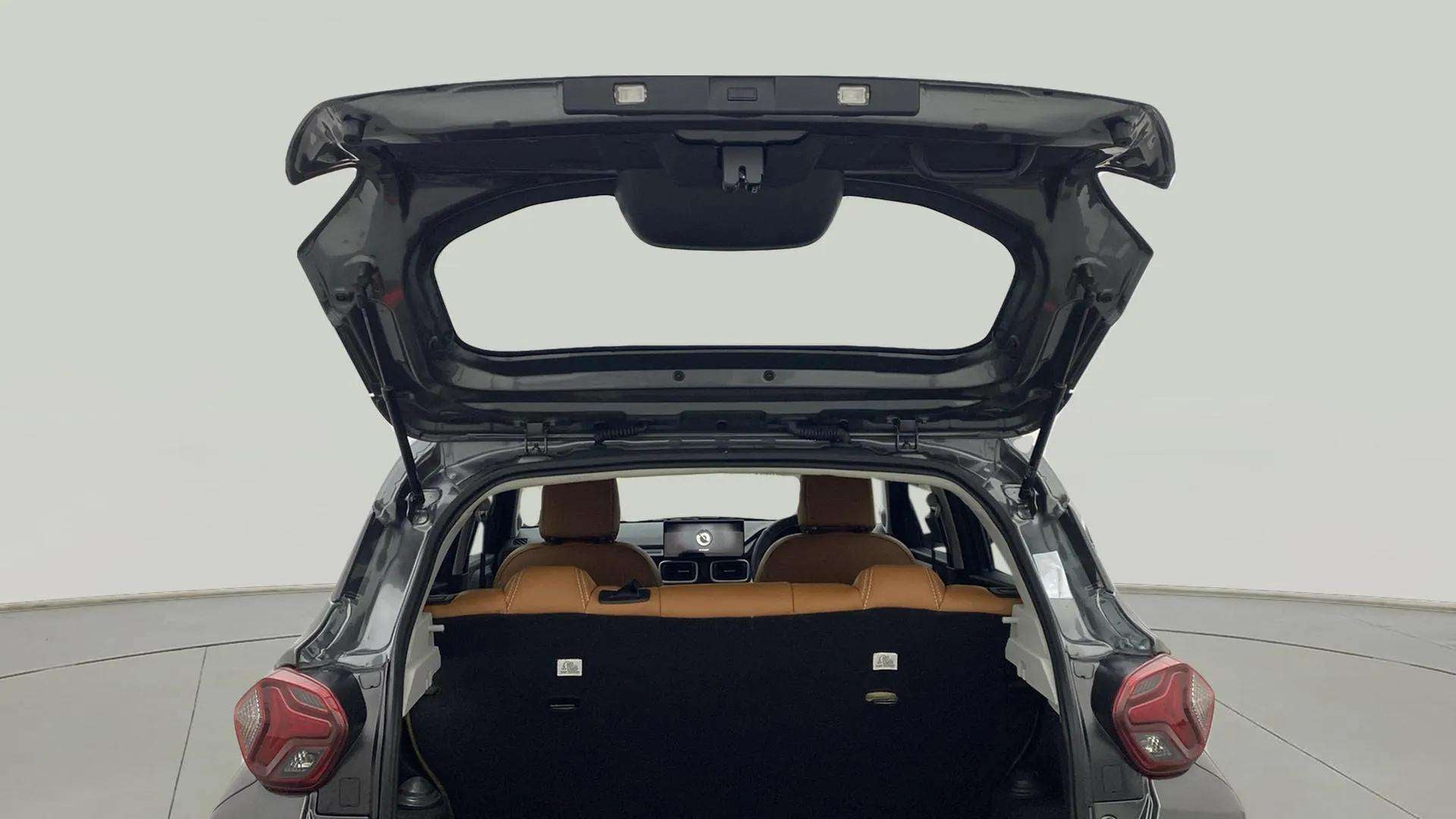 Rear view of a Tata Punch with open boot