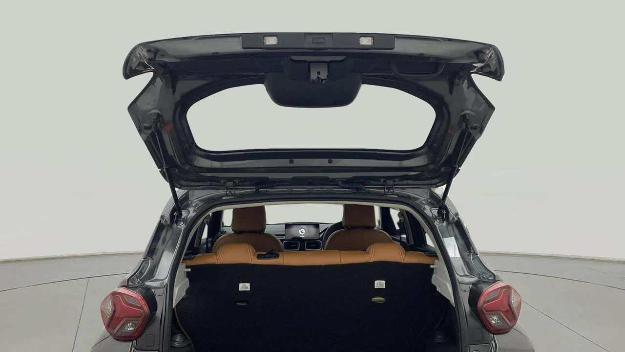 Rear view of a Tata Punch with open boot