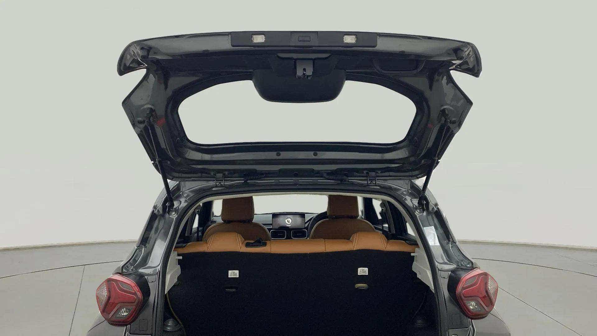 Rear view of a Tata Punch with open boot