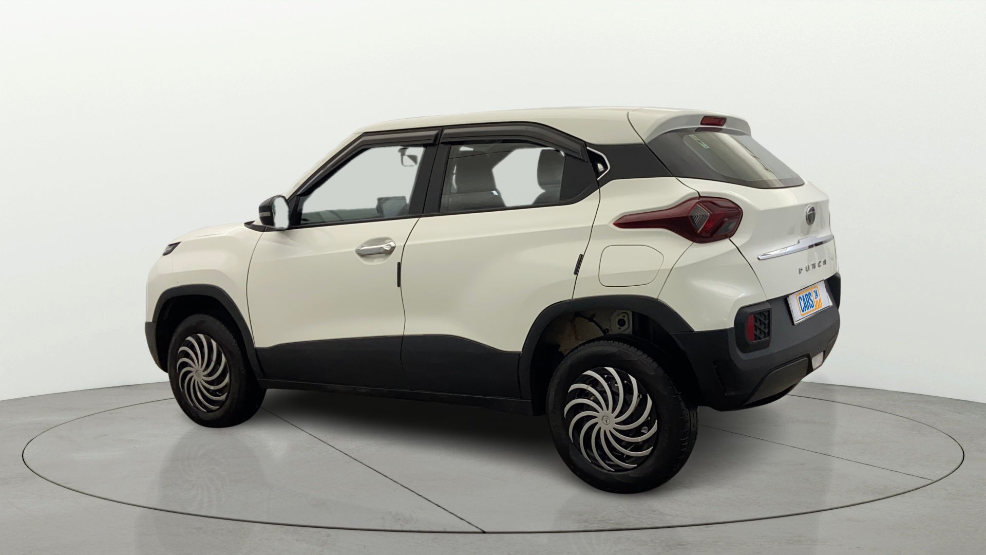 Rear three-quarter view of a Orcus White Tata Punch