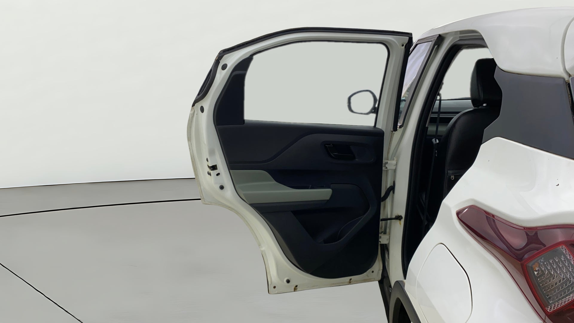 Rear door open view of a Orcus White Tata Punch