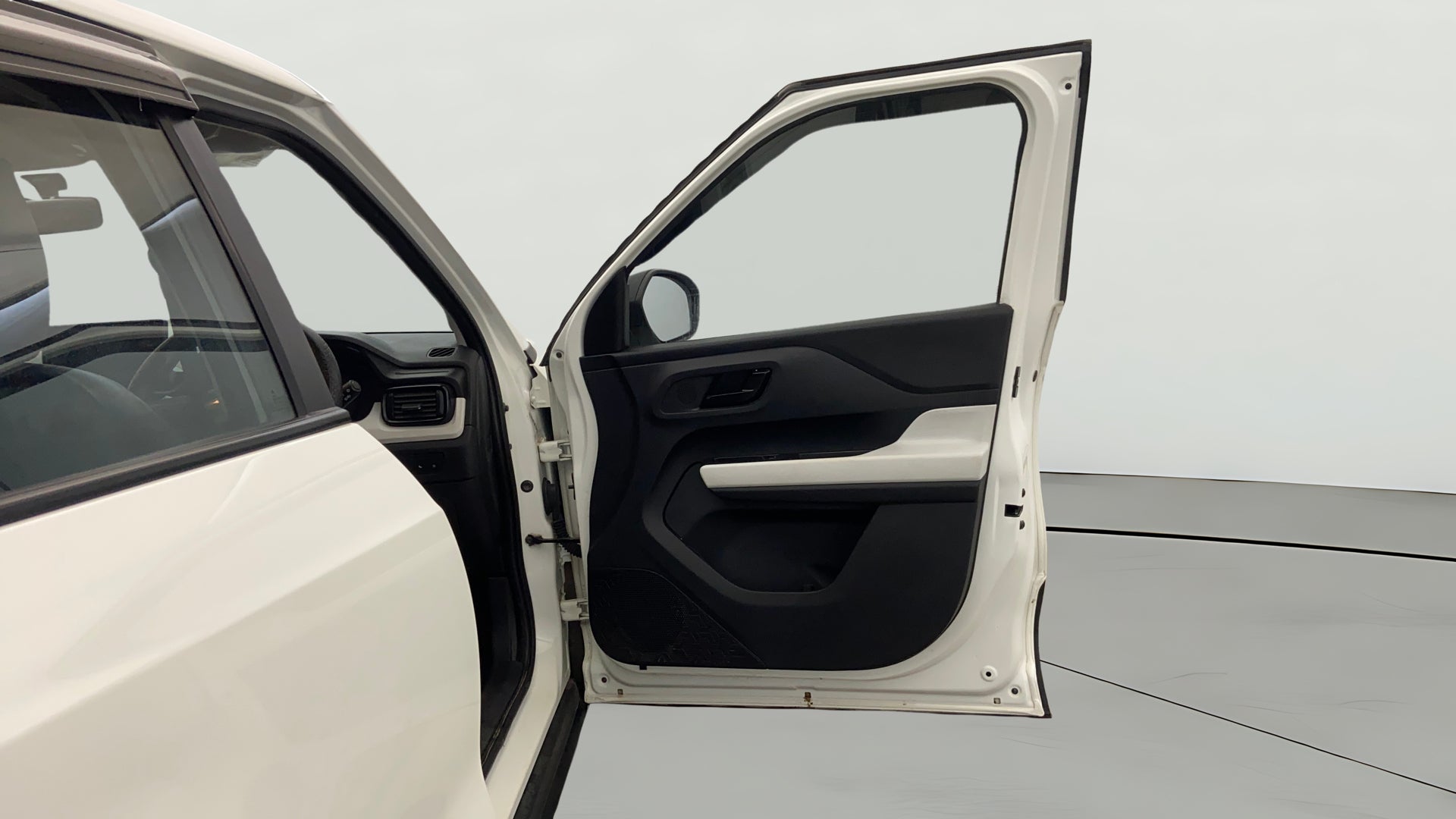 Front driver side door and interior of a Tata Punch