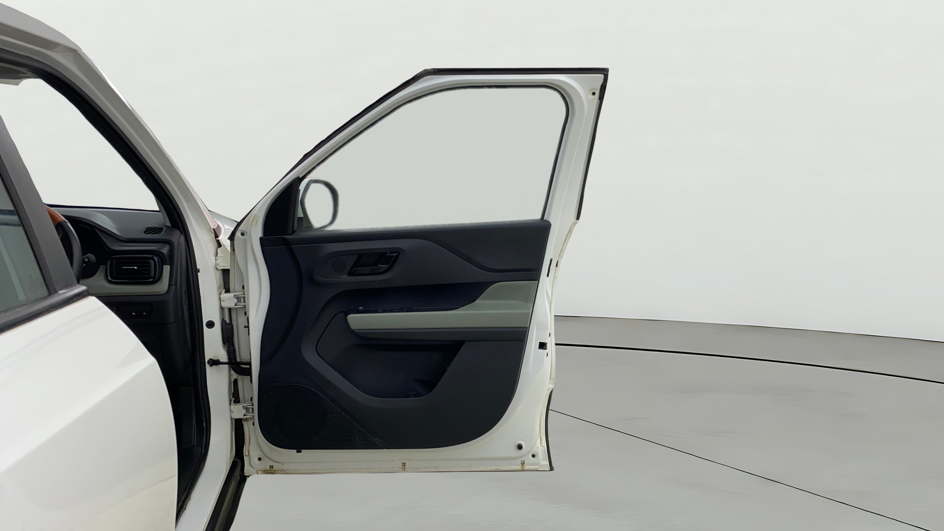 Front driver door interior of a Tata Punch