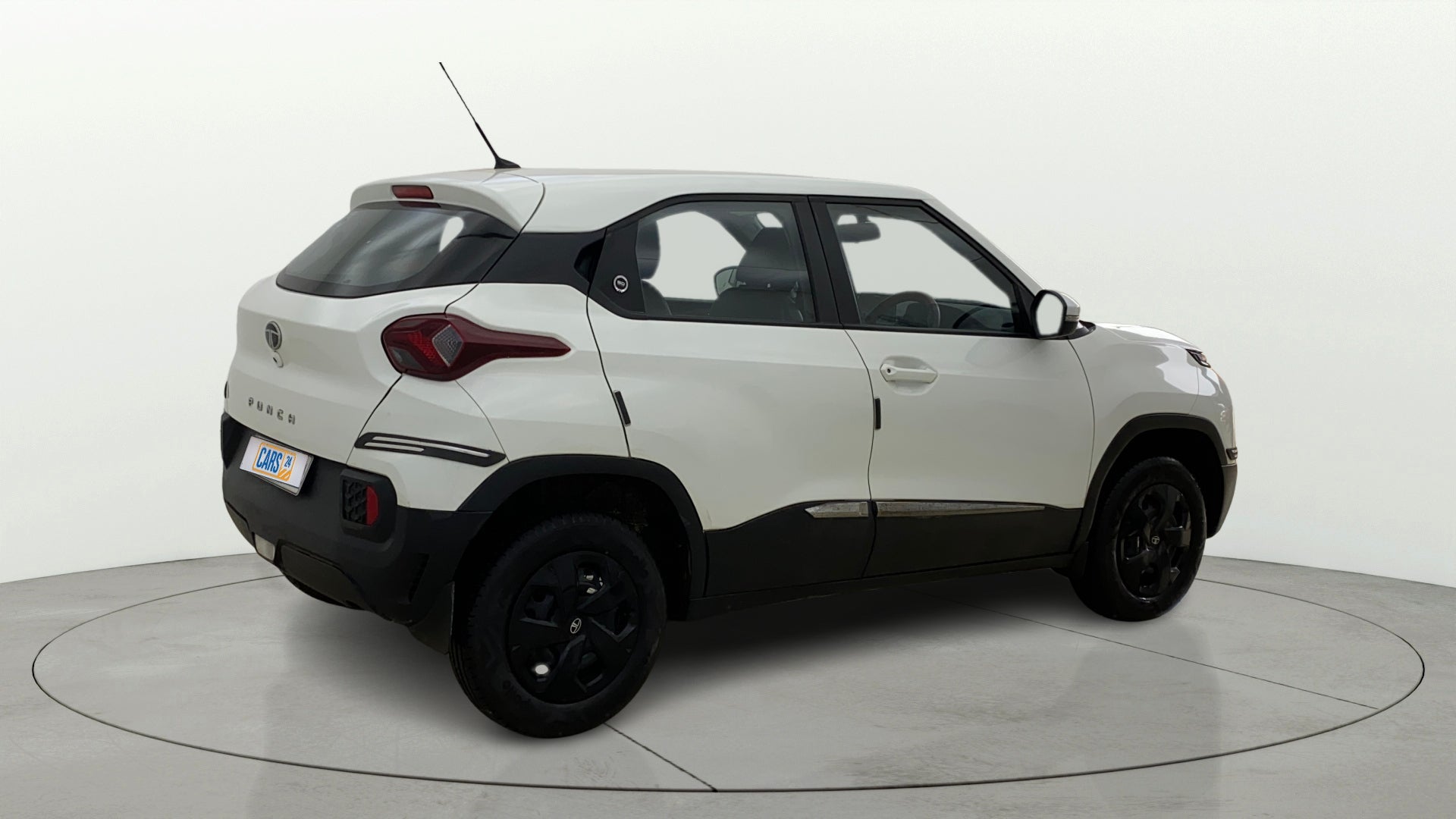 Rear three-quarter view of a Orcus White Tata Punch