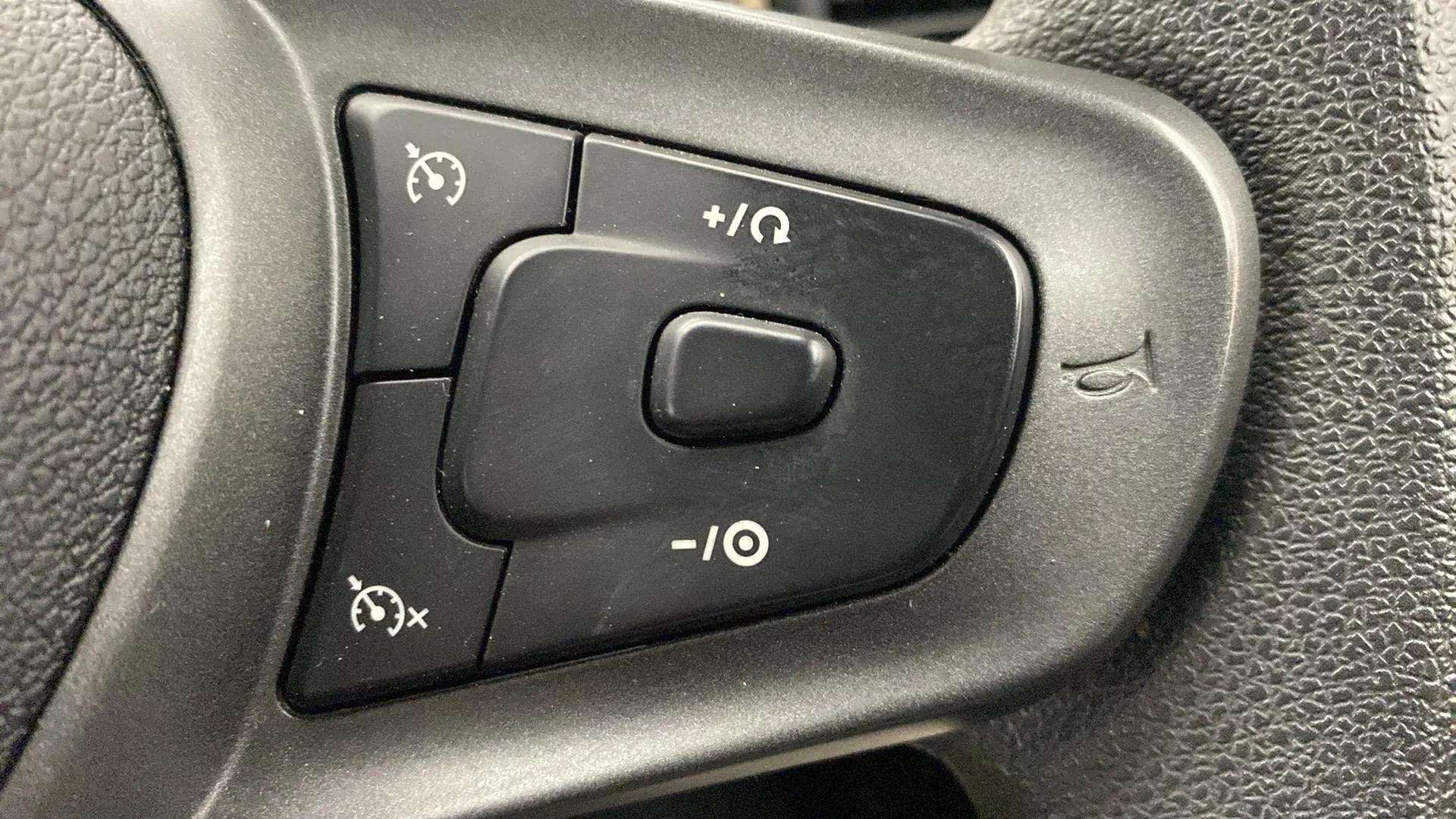 Steering wheel cruise control buttons of a Tata Punch