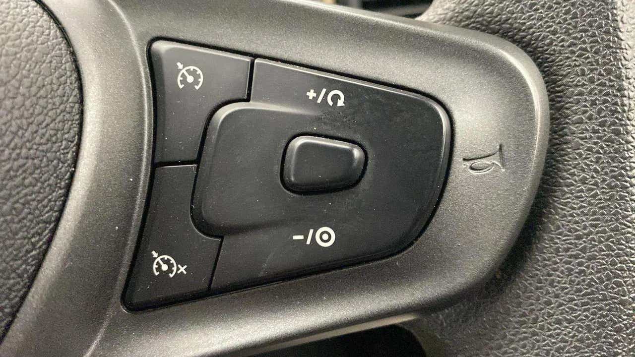 Steering wheel cruise control buttons of a Tata Punch