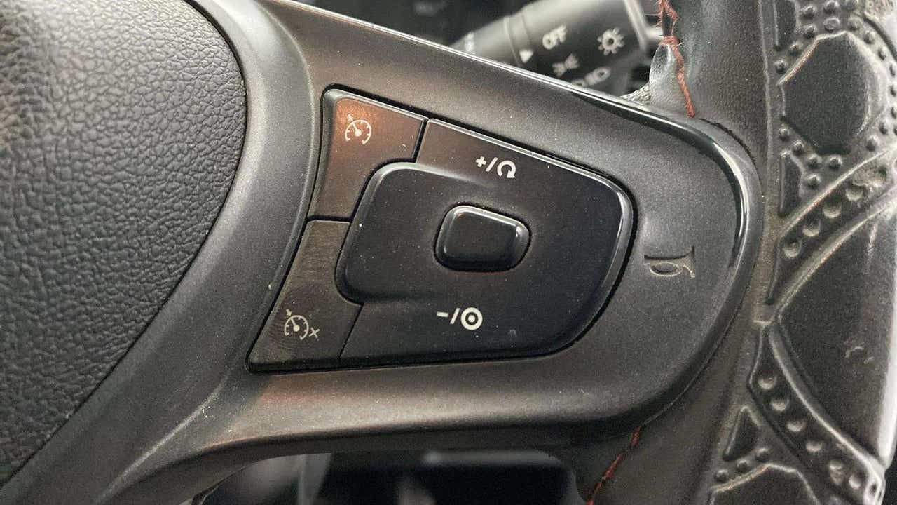 Steering wheel cruise control buttons of a Tata Punch