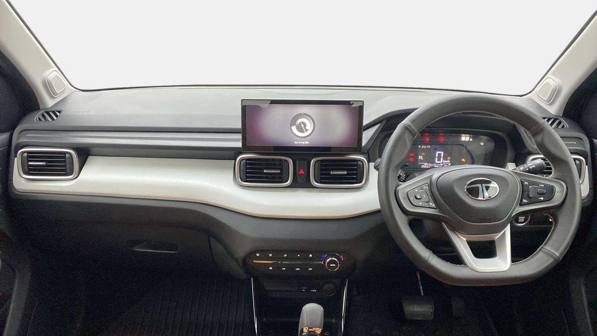 Dashboard and steering wheel view of a Tata Punch