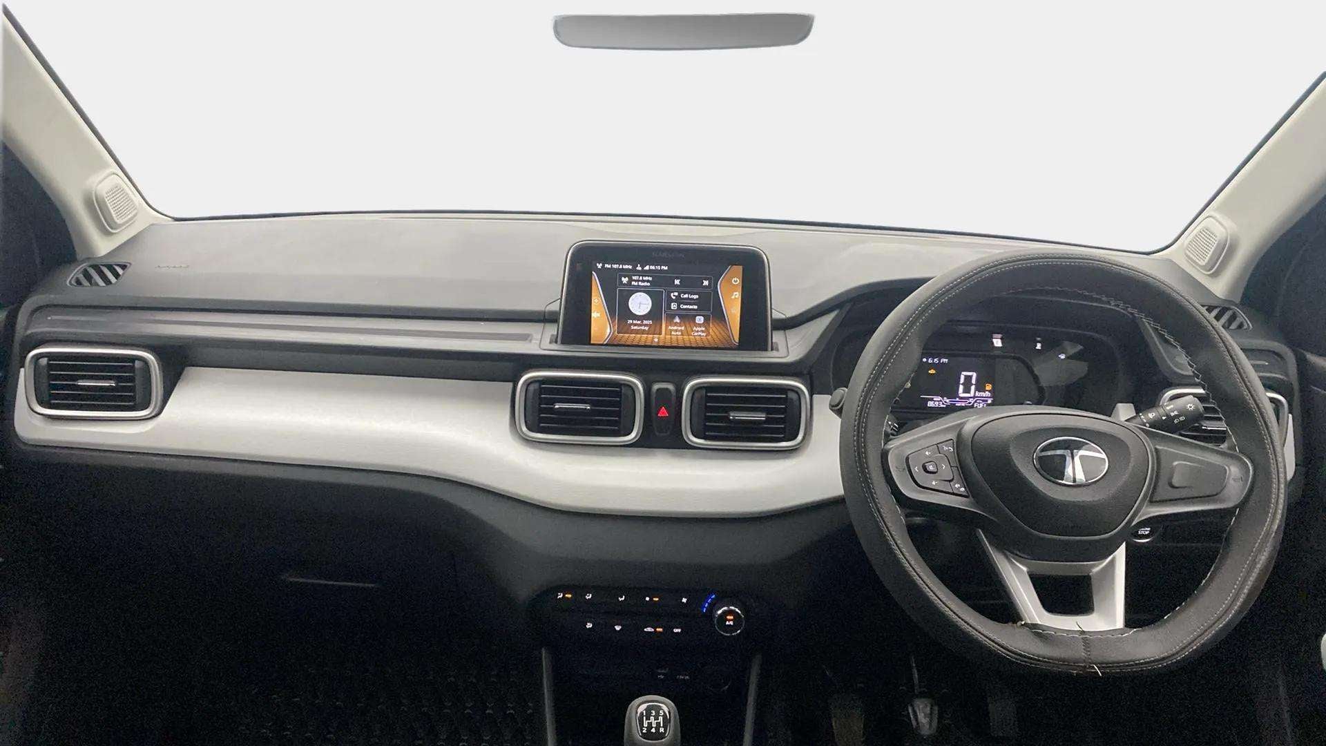 Dashboard and steering wheel interior of a Tata Punch