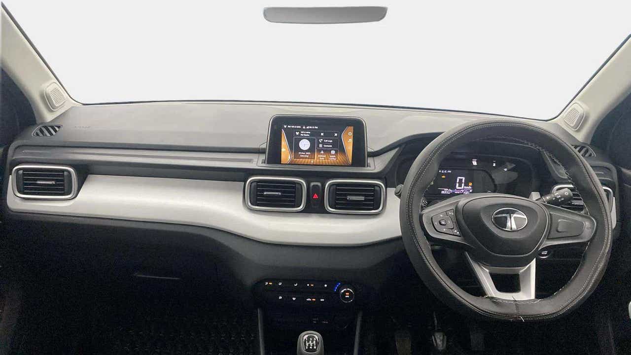 Dashboard and steering wheel interior of a Tata Punch